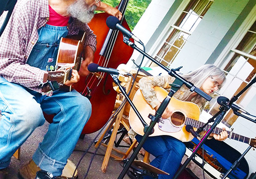 Bluegras on the Porch our around thefire for cozy winter weekends at Graves Mountain Farm and Lodges VA Blue Ridge