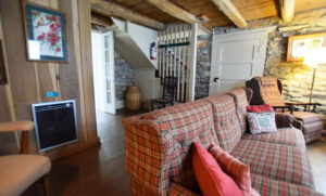 Living room looking back to hall and kitchen