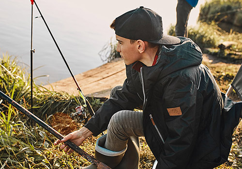 Winter fishing on pond or stream at Graves Mountain Farm & Lodges