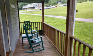Front Porch of Old Farmhouse #8 with rocking chairs
