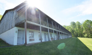 Exterior and Porch of Mountainside Lodge Room at Graves Mountain Farm & Lodges in the VA Blue Ridge Mountains