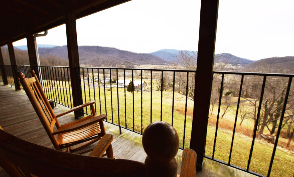 Shared Porches with Rockers and Exterior Lodge Room Entrances - for Shenandoah National Park View Hotel at Graves Mountain